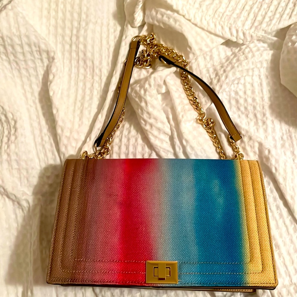INC International Concepts multicolor bag with gold chain.